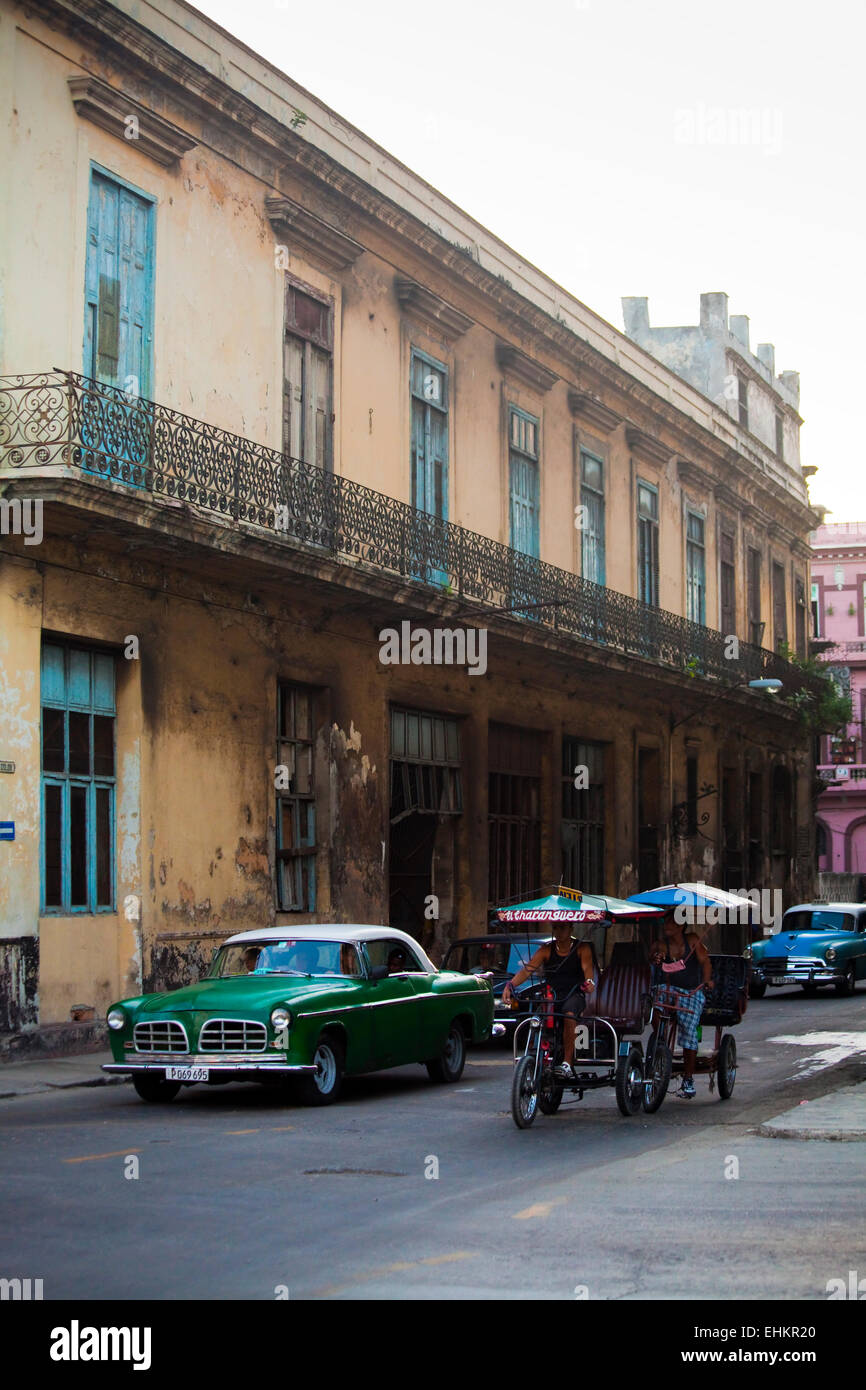 Classic car and bicycle taxi, Havana, Cuba Stock Photo