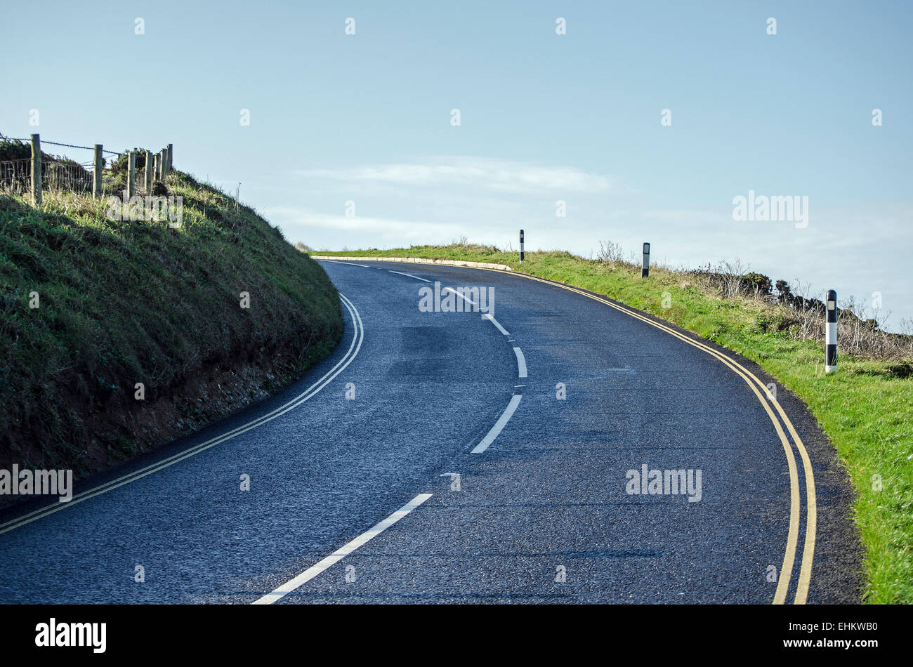 a bend in a road with no traffic Stock Photo