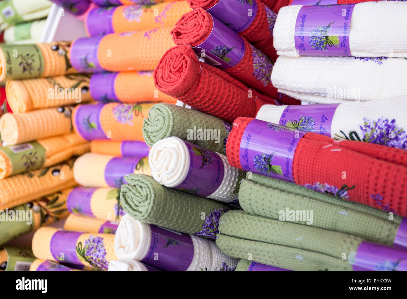 Selection of colorful patterned textiles at a French market, Provence, France, Europe Stock Photo