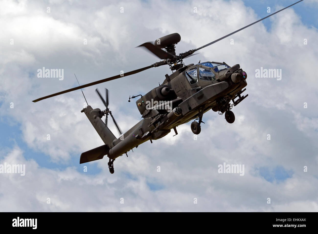 A British Army Air Corps AugustaWestland WAH-64D Apache AH.1 helicopter flies over Salisbury Plain in Wiltshire, United Kingdom. Stock Photo
