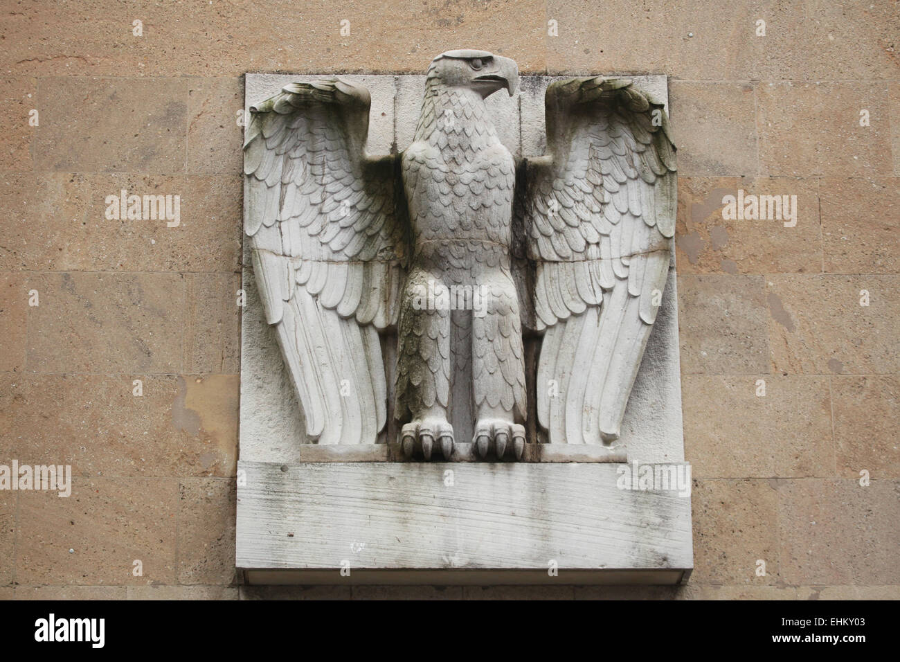 Reichsadler. Nazi eagle from the 1930s on the main building of the Tempelhof Airport in Berlin, Germany. Stock Photo