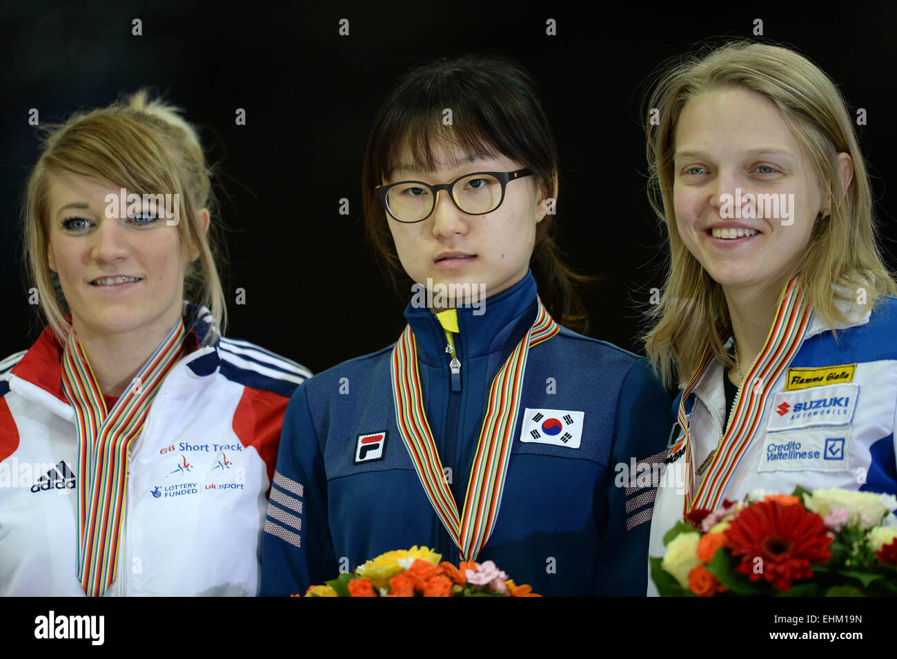 Moscow, Russia. 15th Mar, 2015. Silver medalist Elise Christie of Britain, Minjeong Choi of South Korea and bronze medalist Arianna Fontana of Italy (L to R) pose during the awarding ceremony of ladies' 1000m final at ISU World Short Track Speed Skating Championships in Moscow, Russia, March 15, 2015. © Pavel Bednyakov/Xinhua/Alamy Live News Stock Photo