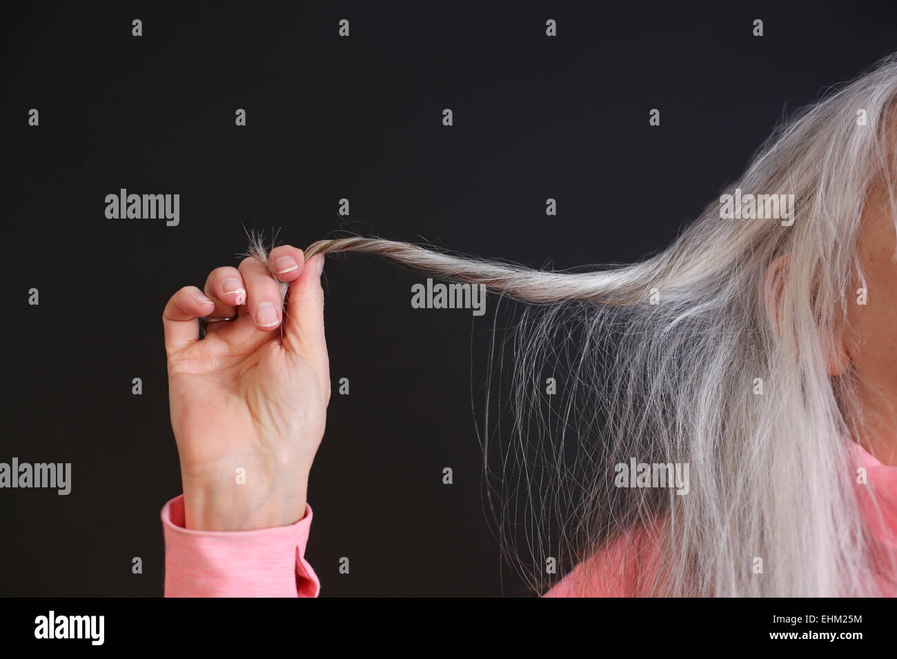 Grey hair strand hi-res stock photography and images - Alamy