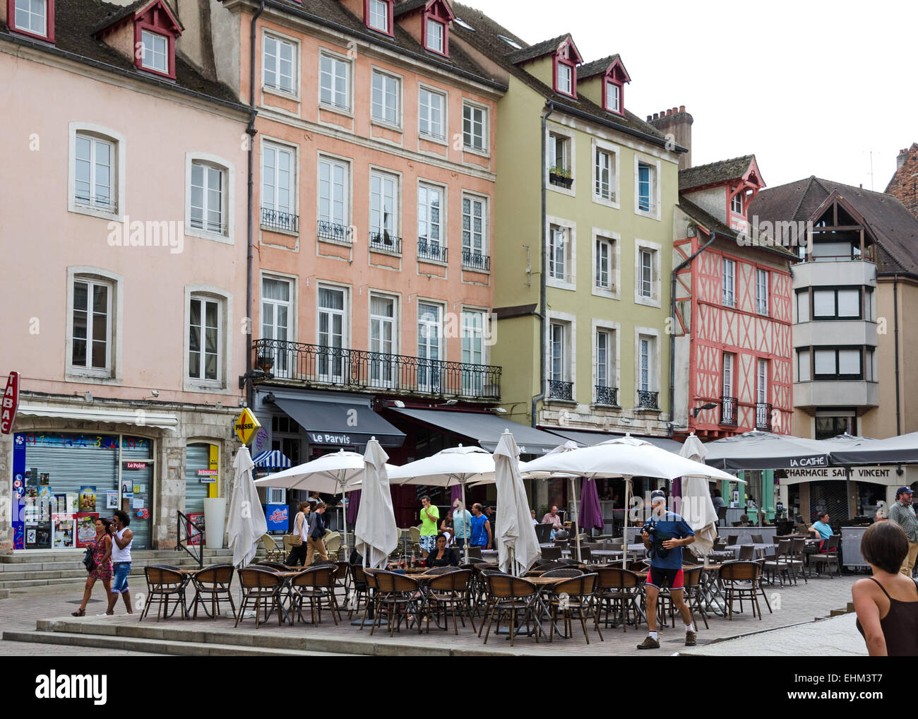 Umbrellas shade outdoor seating in the historic Place Saint-Vincent, Chalon-sur-Saône, Burgundy. Stock Photo