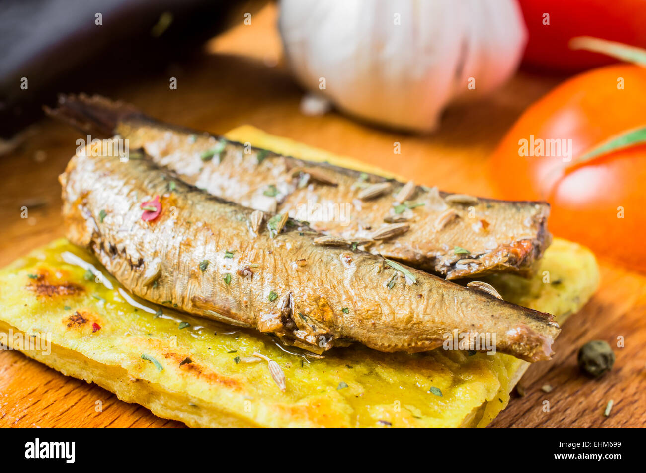 Tapas with fish, sardines or sprats Stock Photo - Alamy