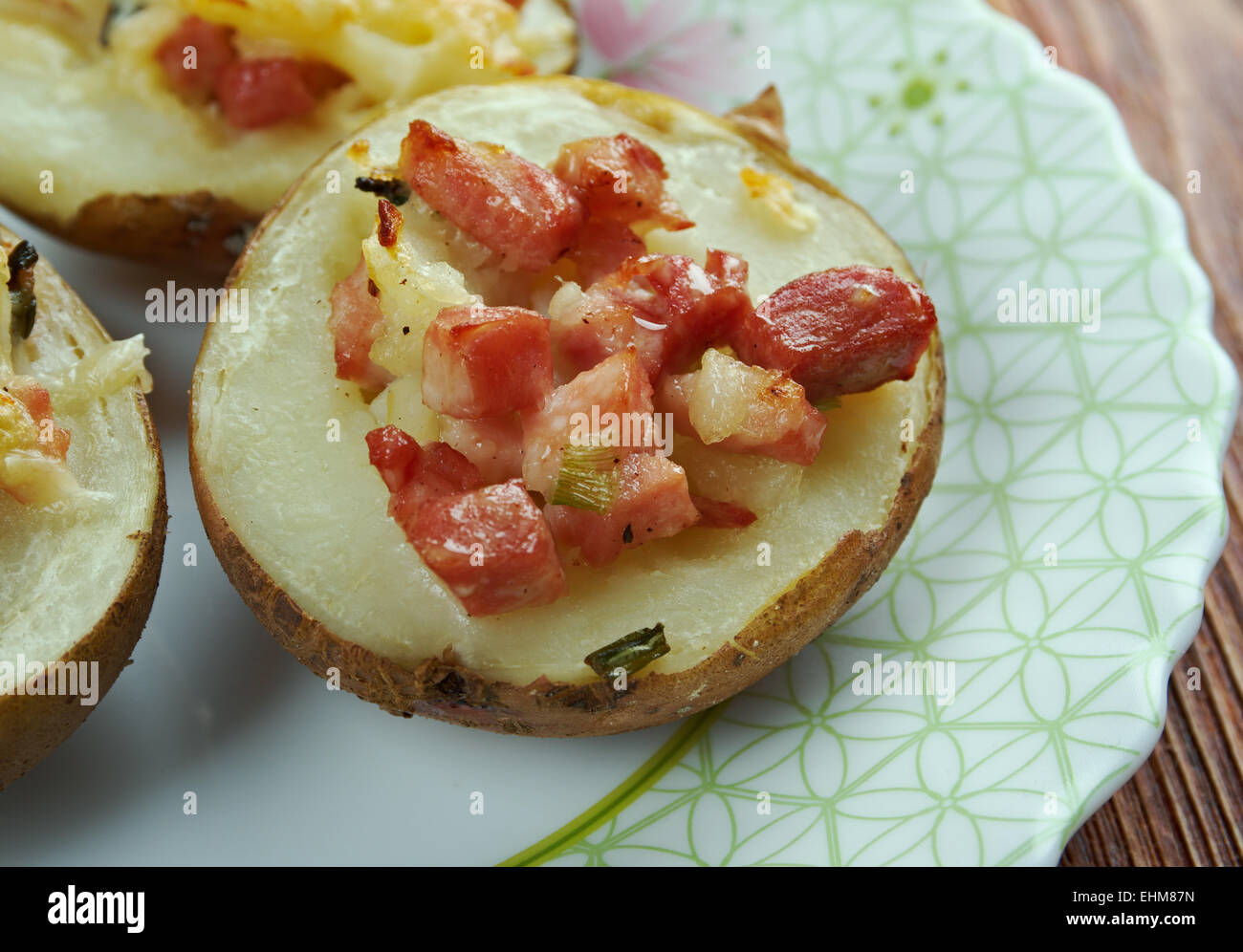 Stuffed Baked Potatoes with ham and cheddar cheese Stock Photo