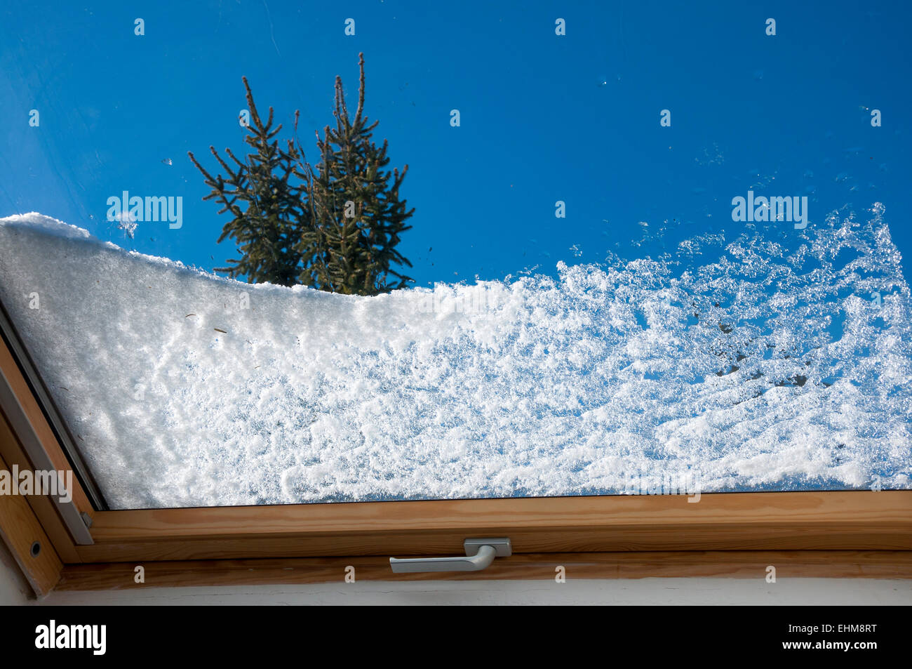 The first snow of the season over the window Stock Photo - Alamy