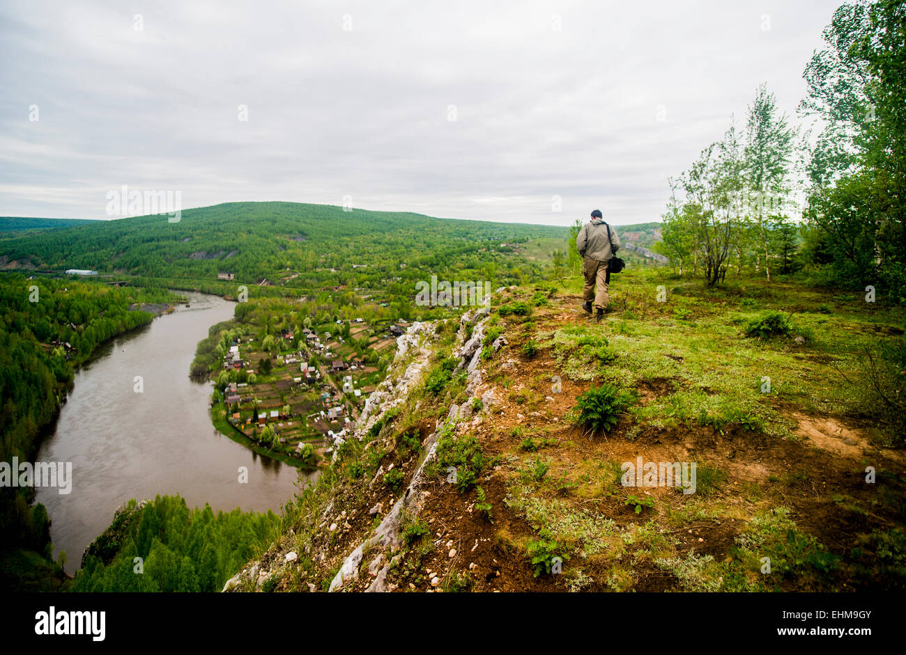 Caucasian man hiking in remote landscape Stock Photo - Alamy