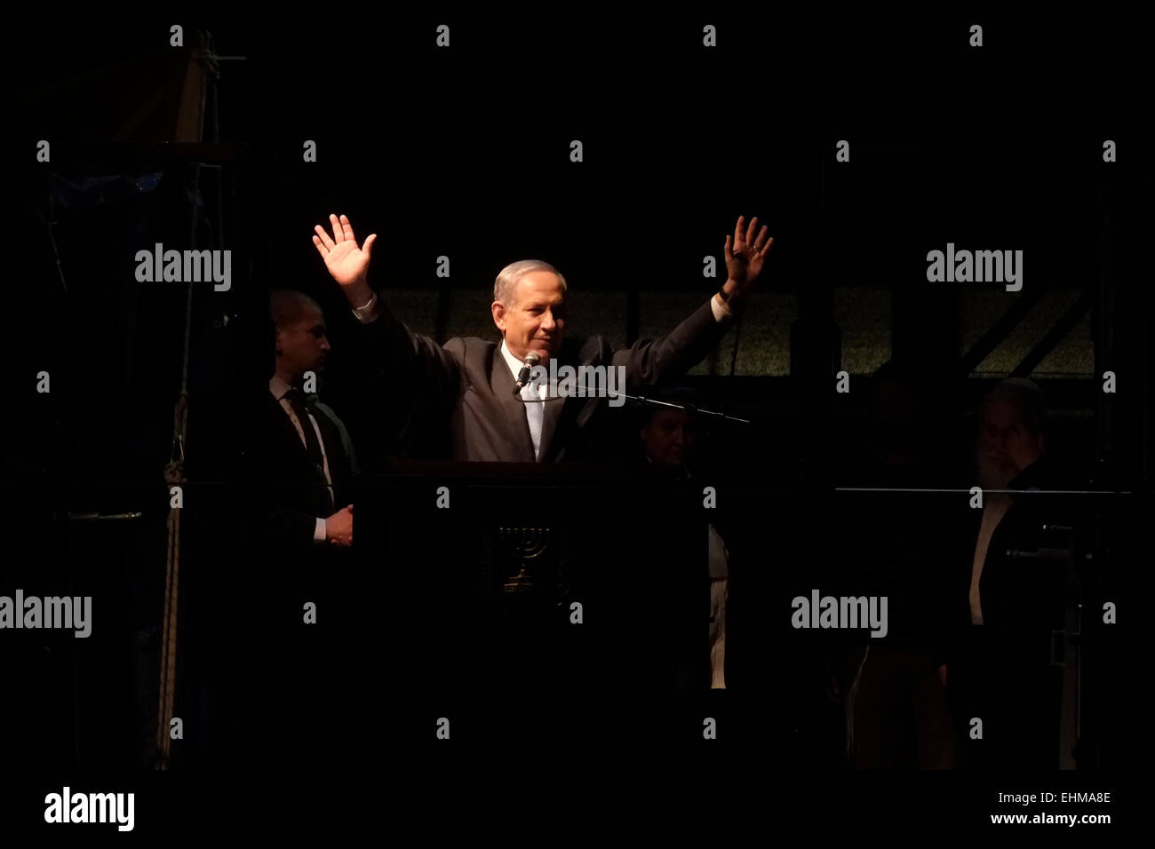 Tel Aviv, Israel. 15th March. Israeli Prime Minister Benjamin Netanyahu waves during his election rally in Tel Aviv, Israel, March 15, 2015. Over 40,000 gathered in Tel Aviv to support the right-wing ruling Likud Party headed by Israeli Prime Minister Benjamin Netanyahu two days before the country's general election as polls predict end of his reign. Credit:  Eddie Gerald/Alamy Live News Stock Photo