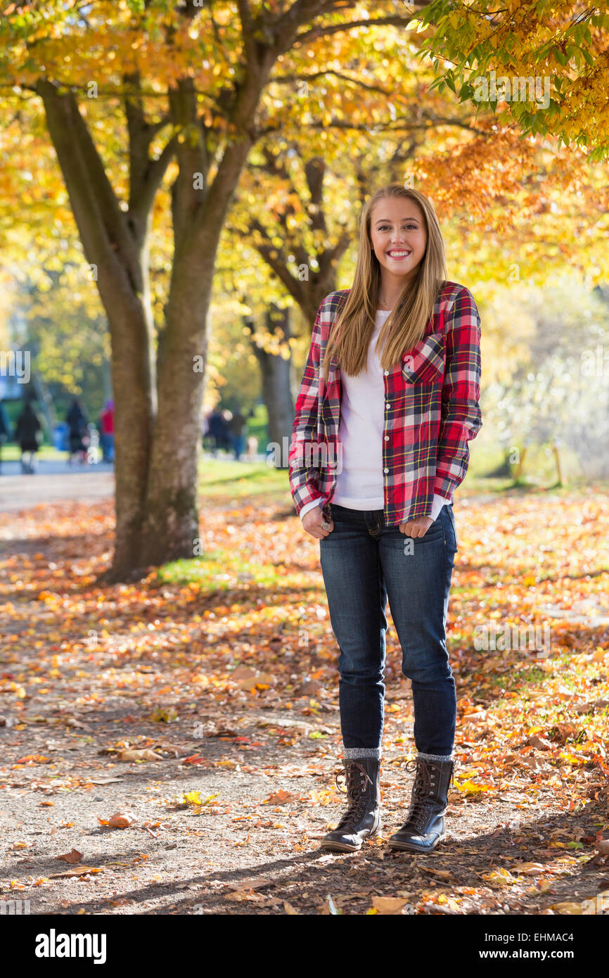 Caucasian woman smiling in park Stock Photo