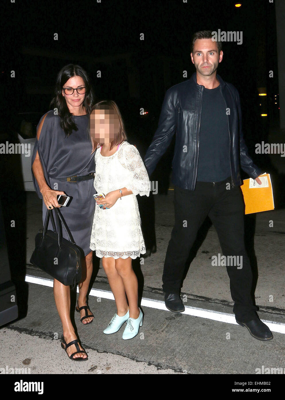 Courteney Cox arriving at Craig's with her finace, Johnny McDaid and