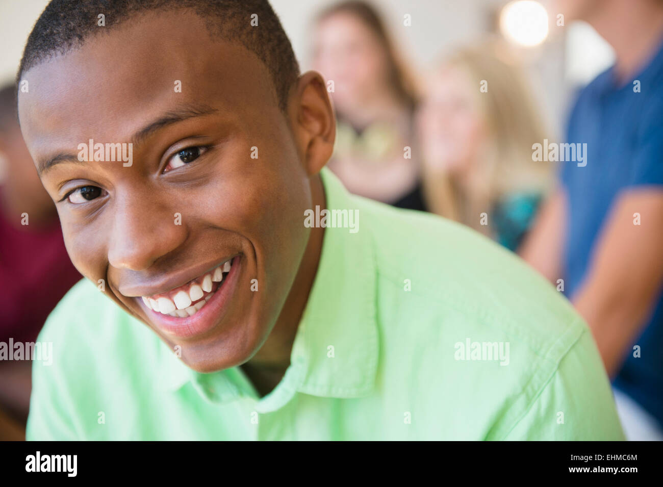Close up of smiling face of teenage boy Stock Photo