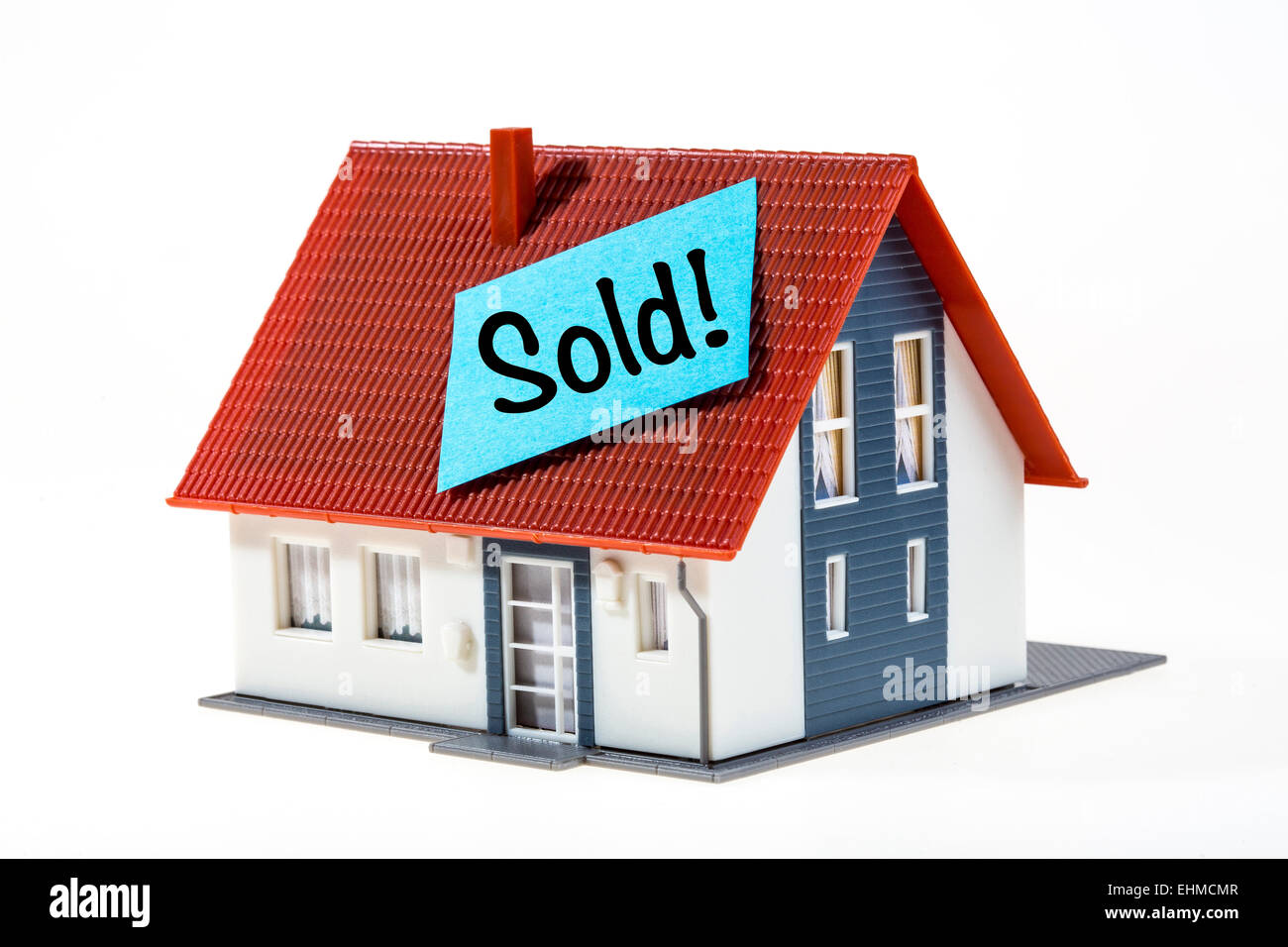 Symbolic image, house with a Post-it note, sold Stock Photo