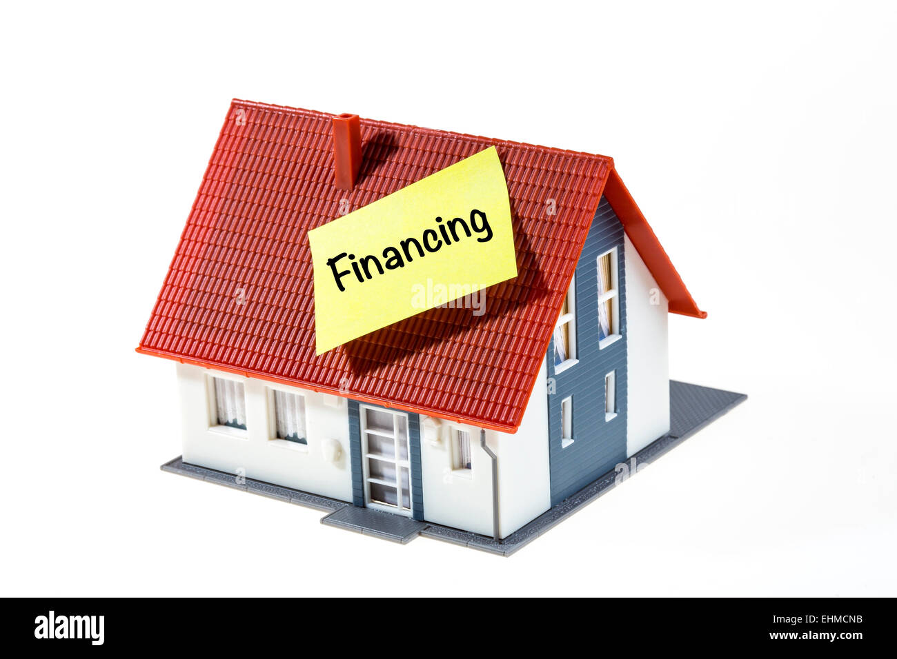 Symbolic image, house with a Post-it note, financing Stock Photo