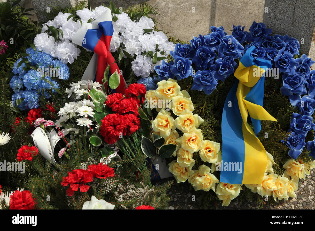 Wreathes decorated with Russian and Ukrainian national flags at the soviet war memorial in Orechov near Brno, Czech Republic. Stock Photo