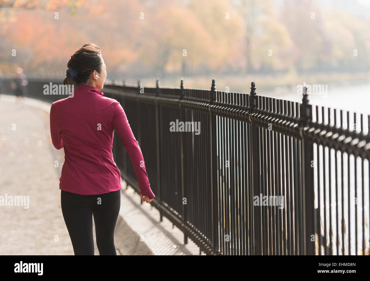 Asian woman walking rear view hi-res stock photography and images - Alamy