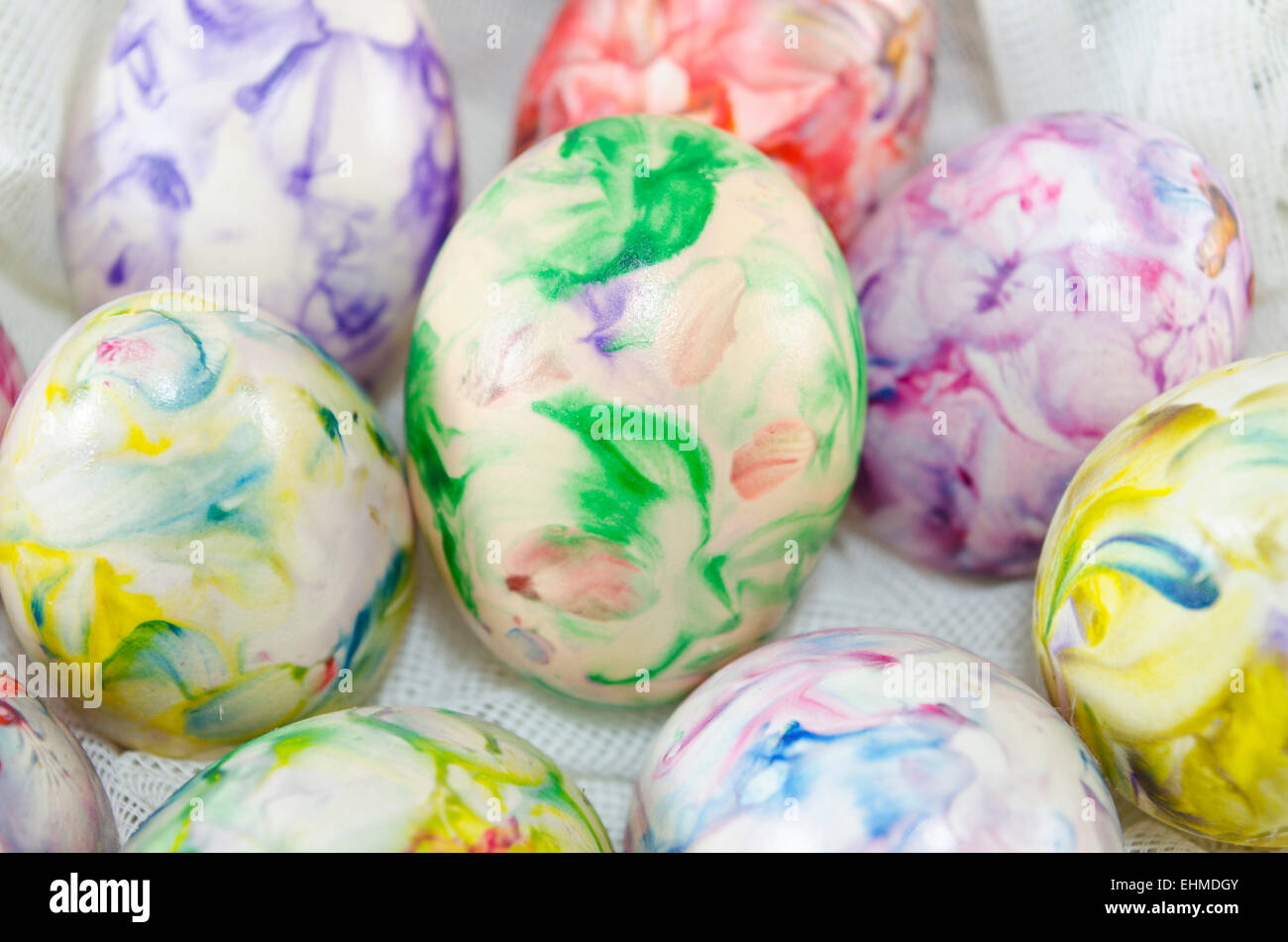 Bunch of hand colored Easter eggs close up Stock Photo
