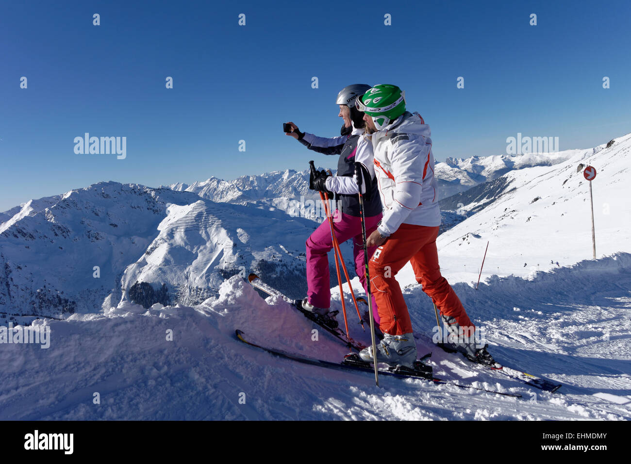 Skiers, couple taking a selfie, Hochfügen in Zillertal valley, Tyrol, Austria Stock Photo