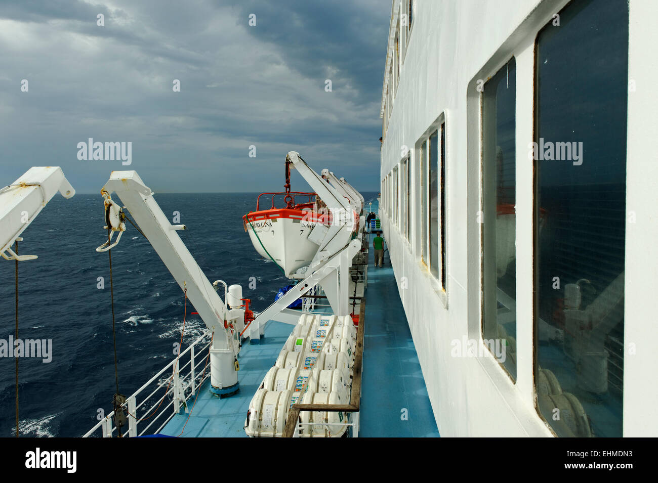 Lifeboat on a ferry during a thunderstorm, dark sky, ferry of Corsica Ferries, Corsica, France Stock Photo