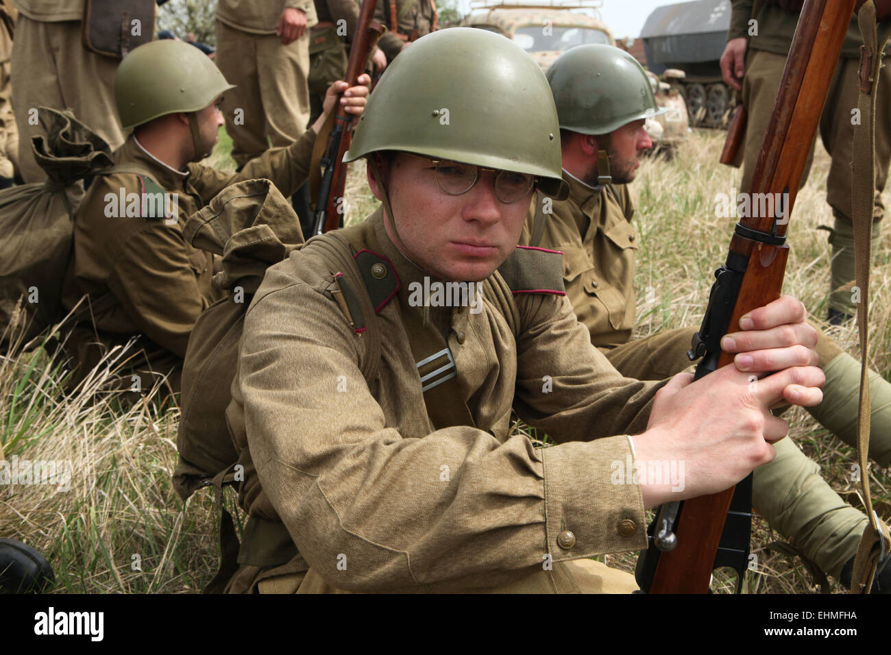 Re-enactors dressed as Soviet soldiers prepare to stage the Battle at Orechov (1945) near Brno, Czech Republic. The Battle at Orechov in April 1945 was the biggest tank battle in the last days of the World War II in South Moravia, Czechoslovakia. Stock Photo