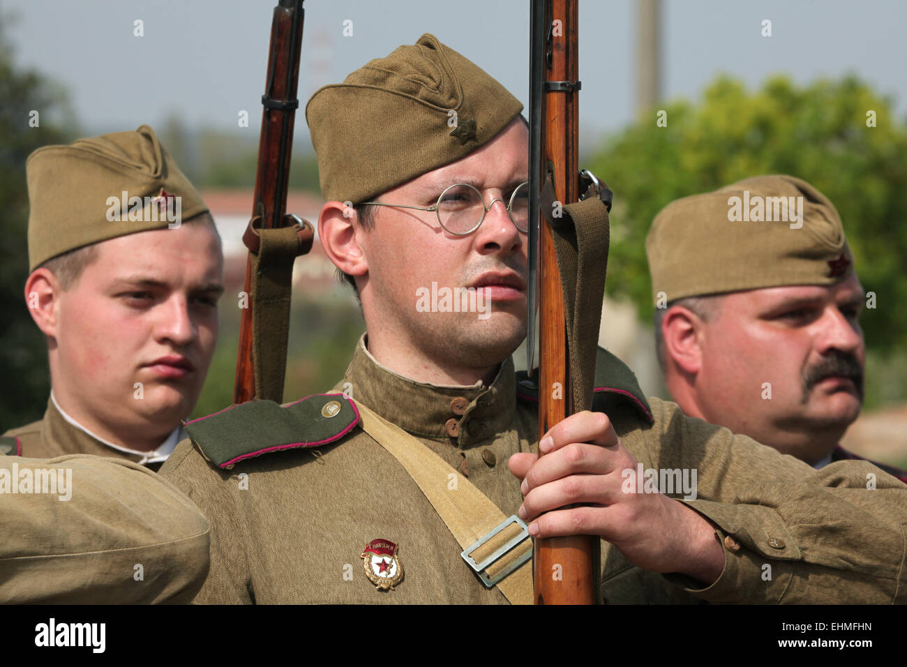 Re-enactors dressed as Soviet soldiers attend the re-enactment of the Battle at Orechov (1945) near Brno, Czech Republic. The Battle at Orechov in April 1945 was the biggest tank battle in the last days of the World War II in South Moravia, Czechoslovakia. Stock Photo