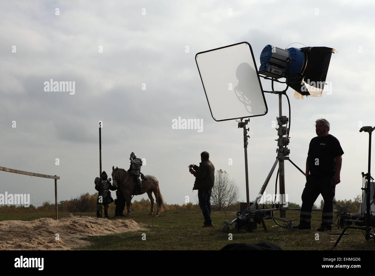 Actor dressed as a medieval knight rides a horse during the filming of the new German film 'Die Ritter' ('The Knights') directed by Carsten Gutschmidt by order of ZDF in Milovice in Central Bohemia, Czech Republic in 23 October 2013. Stock Photo