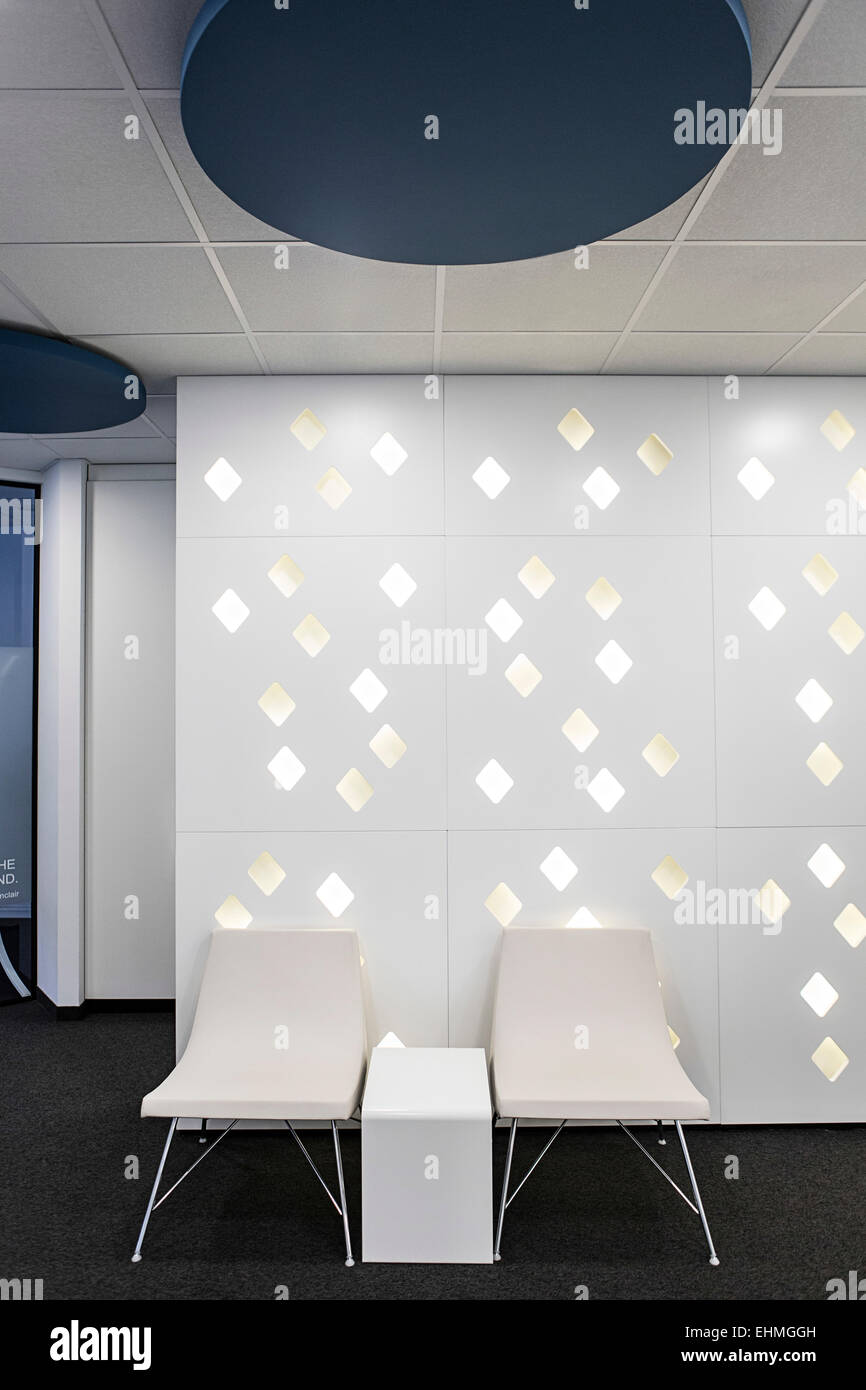 Empty chairs in office lobby Stock Photo Alamy