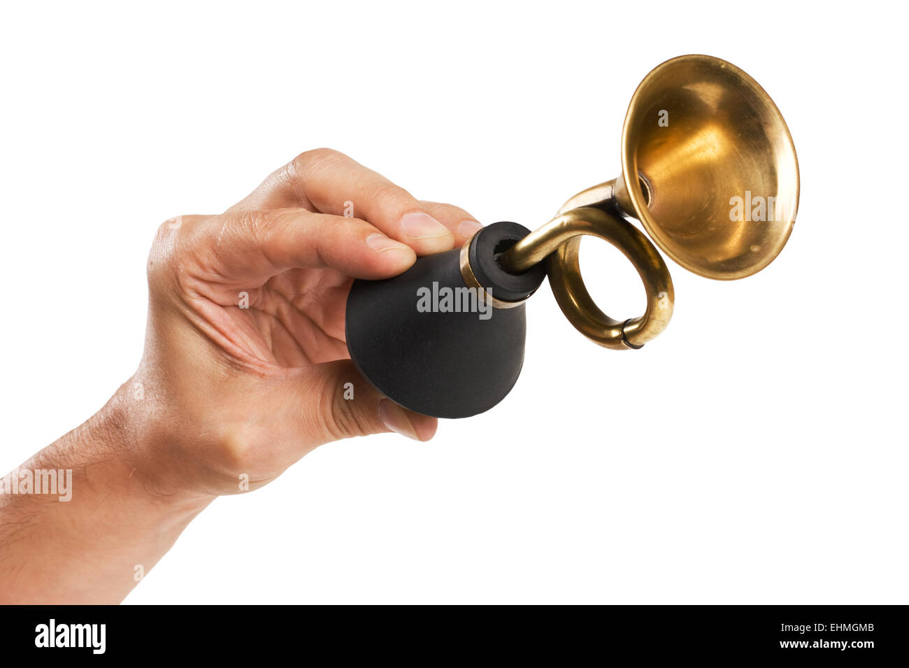 hand holds an old car horn  isolated on a white background Stock Photo