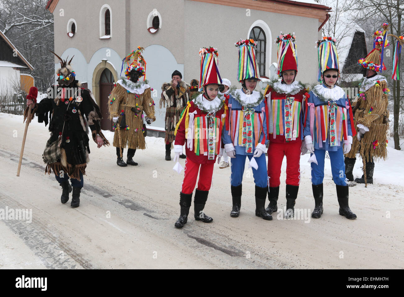 People attend the Masopust Carnival, a ceremonial Shrovetide door-to-door procession, in Vitanov near Pardubice, Czech Republic. Stock Photo