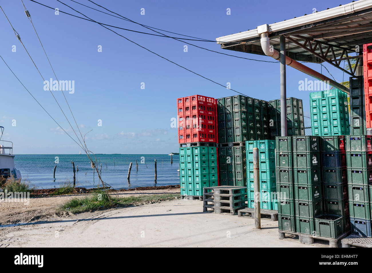 Soft drink & beer crates on Caye Caulker Stock Photo
