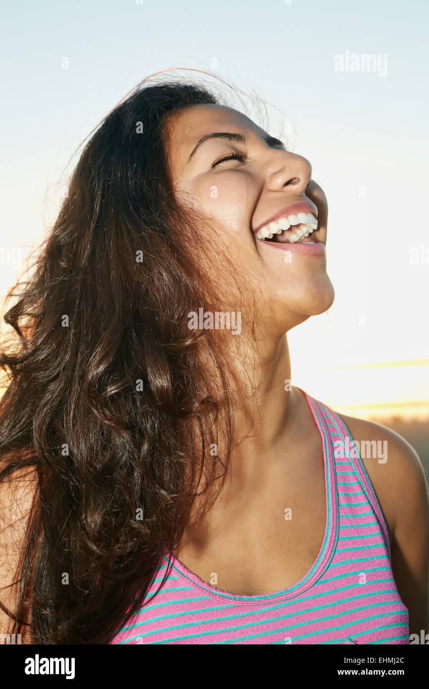 Close up of Hispanic woman laughing Stock Photo