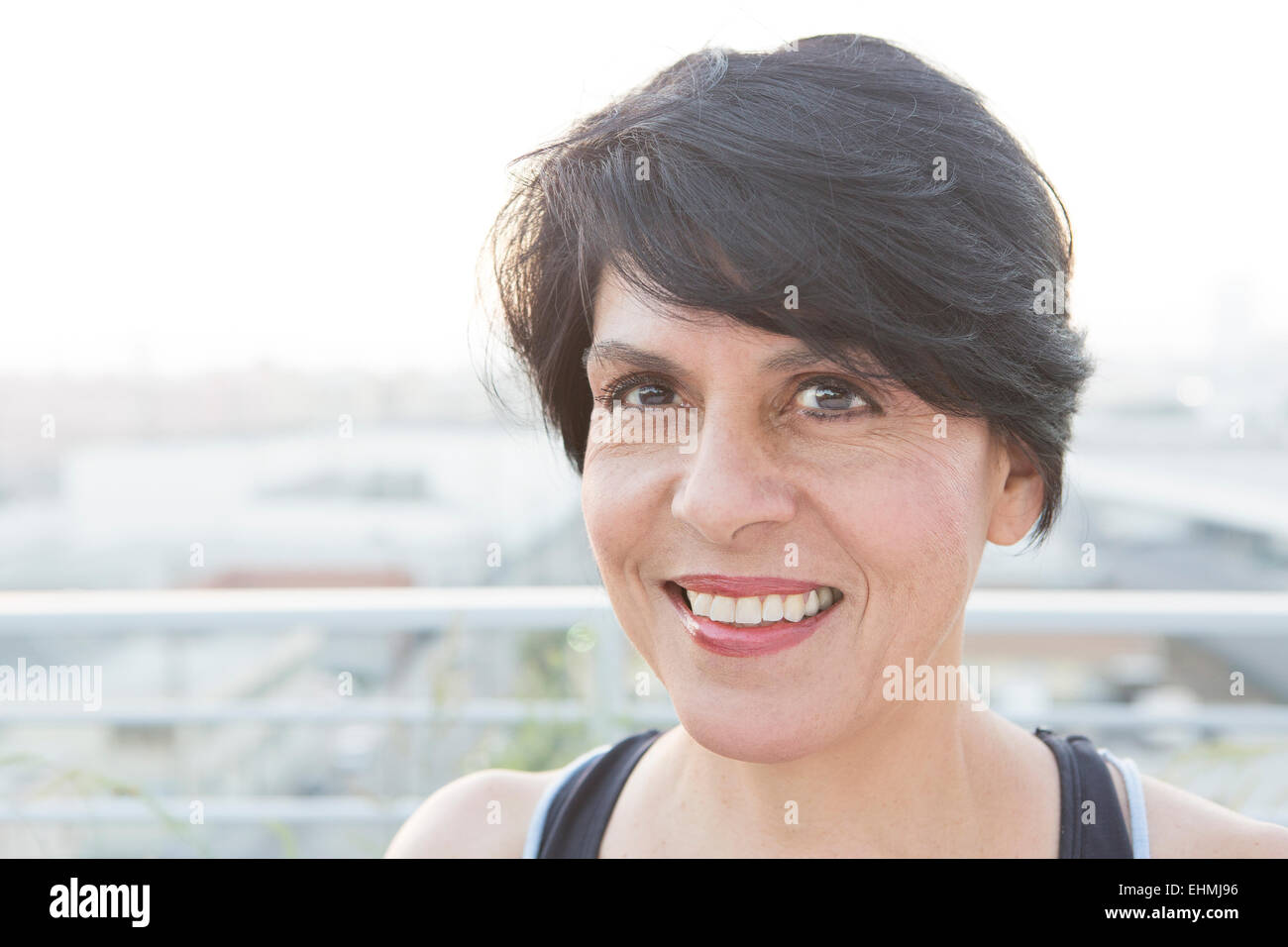 Close up of mixed race woman smiling Stock Photo