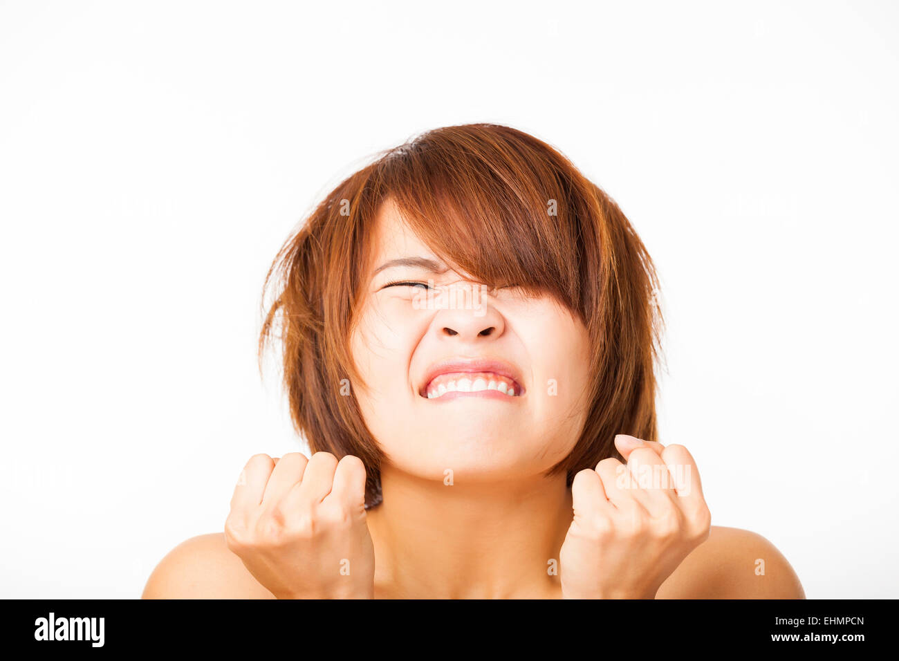 Closeup angry young woman face Stock Photo
