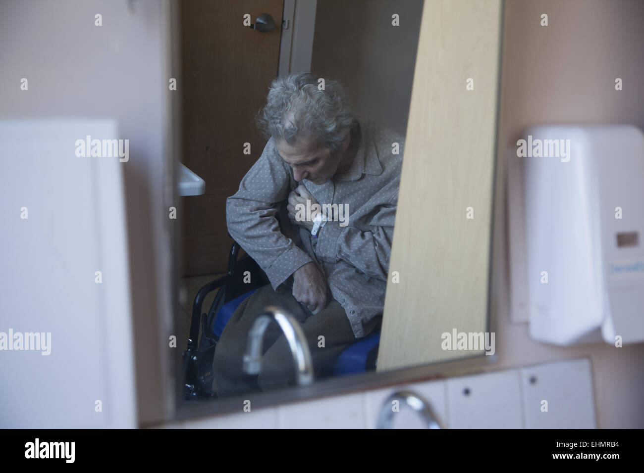 Man with vascular dementia withdrawn from the outside world for the most part. Nursing home, Brooklyn, NY. Stock Photo