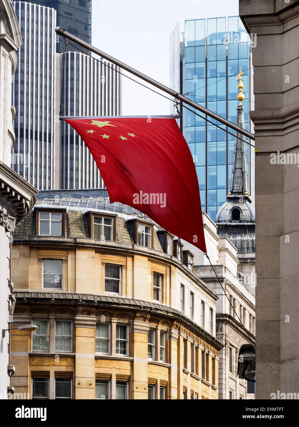 The Chinese flag hangs from offices of the Bank of China in the City of London. China in London. Stock Photo