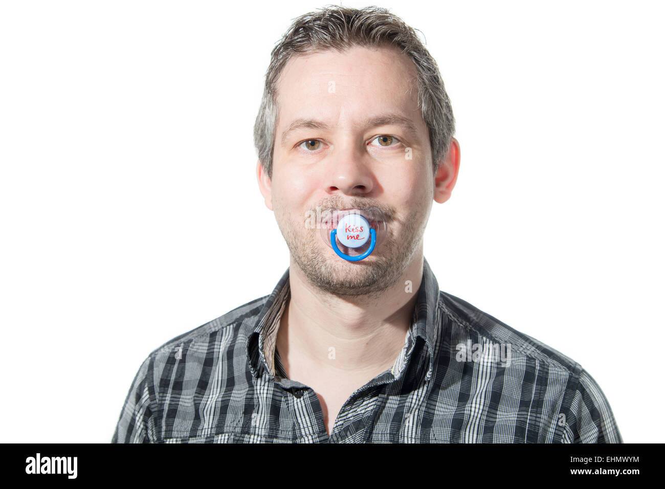 Picture of a man sucking on a pacifier Stock Photo - Alamy