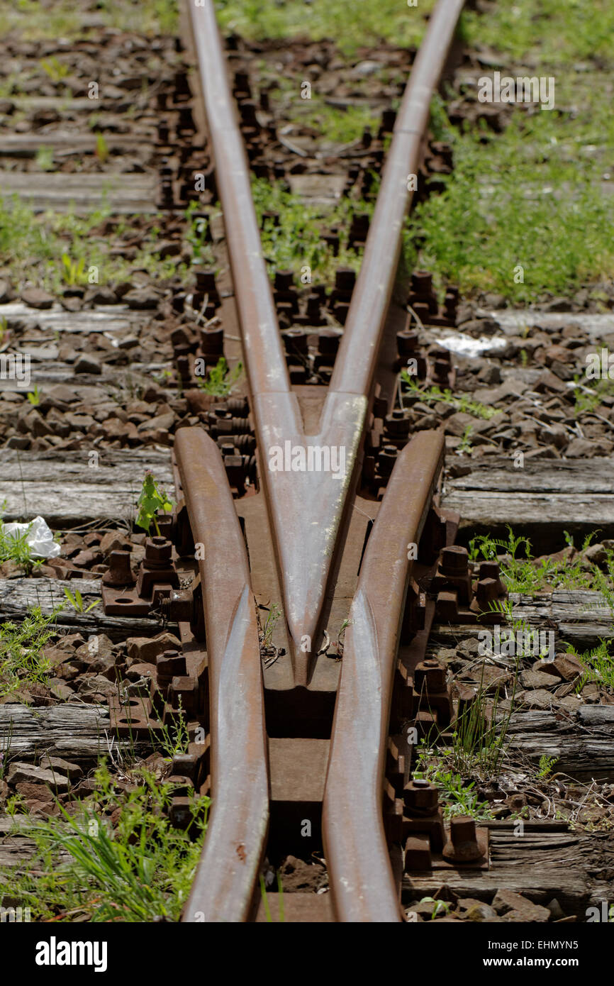 rusty railway track crossing Stock Photo