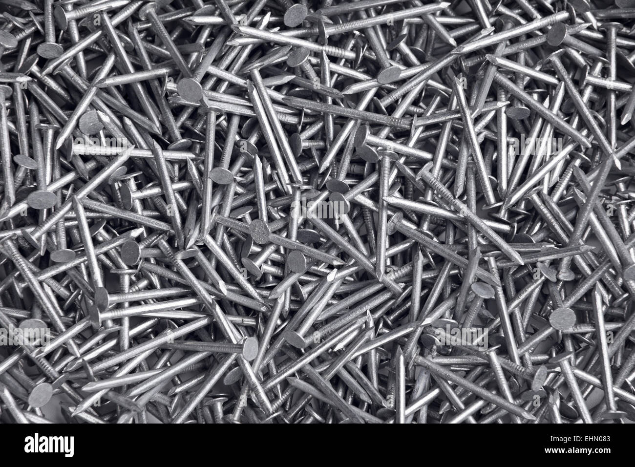 Galvanized nails top view Stock Photo - Alamy