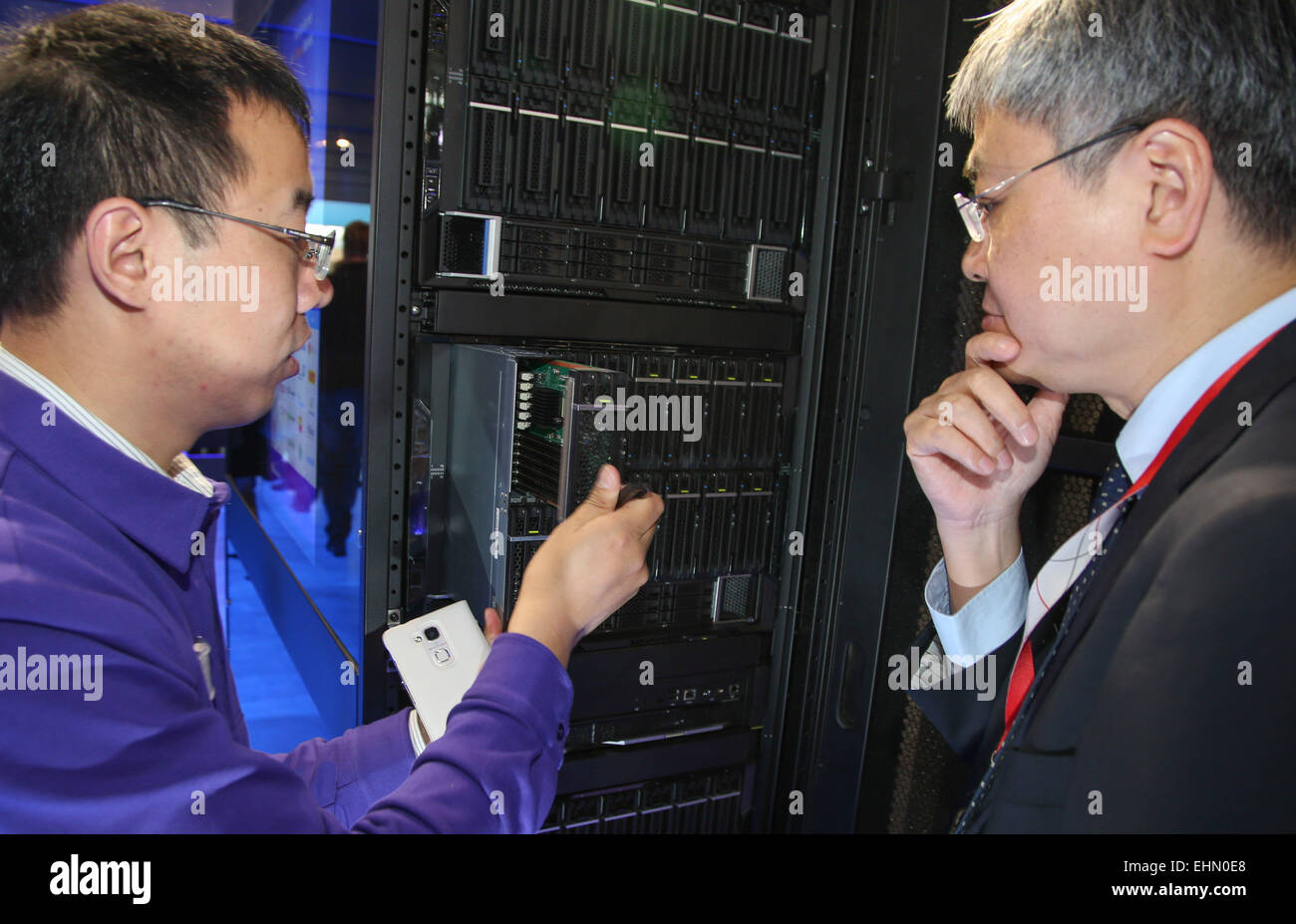 Computermesse Hannover Hanover, Germany. 16th Mar, 2015. A visitor informs himself about ...