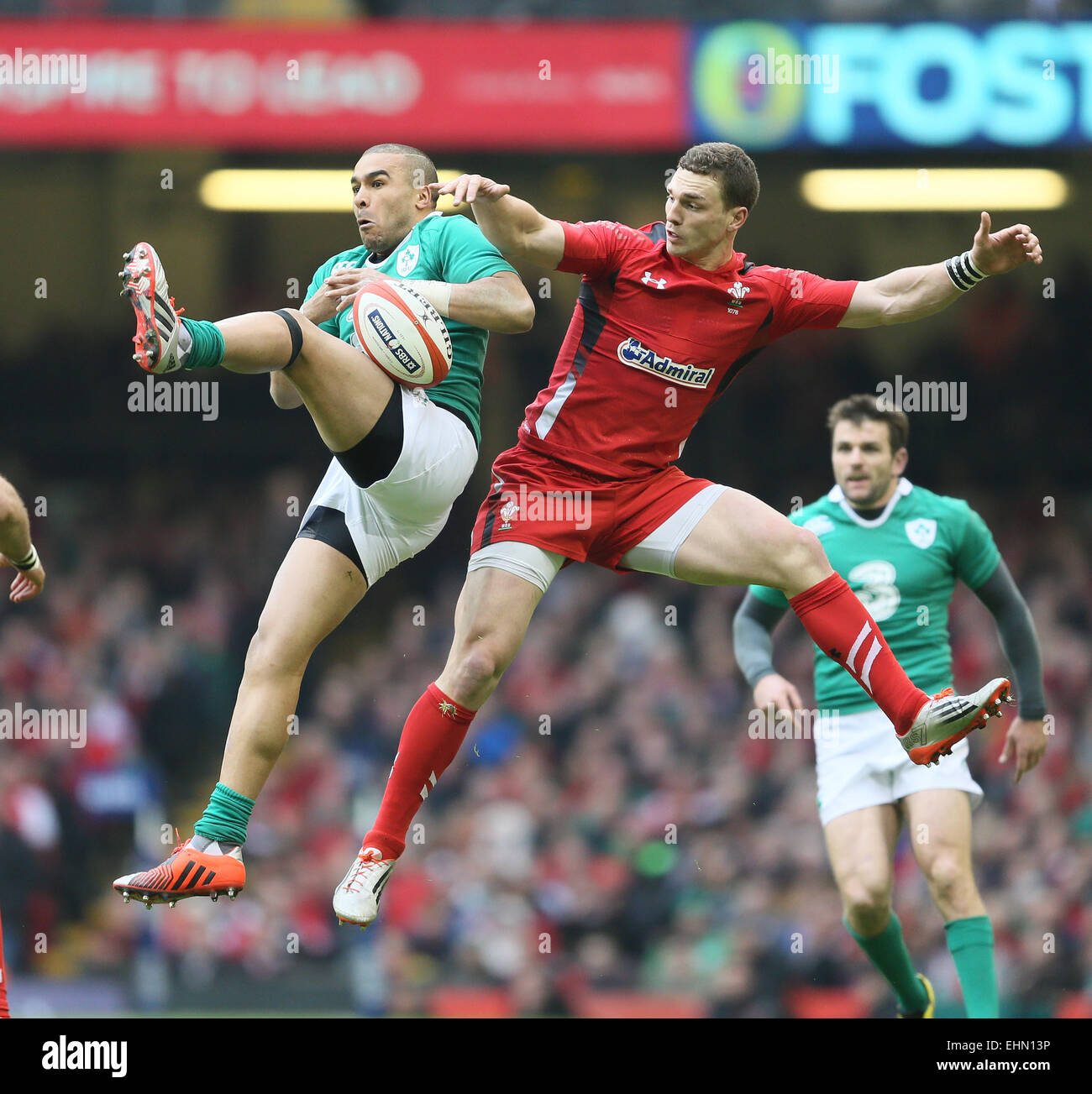 March 14, 2015 - Cardiff, United Kingdom - Simon Zebo of Ireland and George North of Wales challenge for the high ball - RBS 6 Nations - Wales vs Ireland - Millennium Stadium - Cardiff - Wales - 14th March 2015 Stock Photo