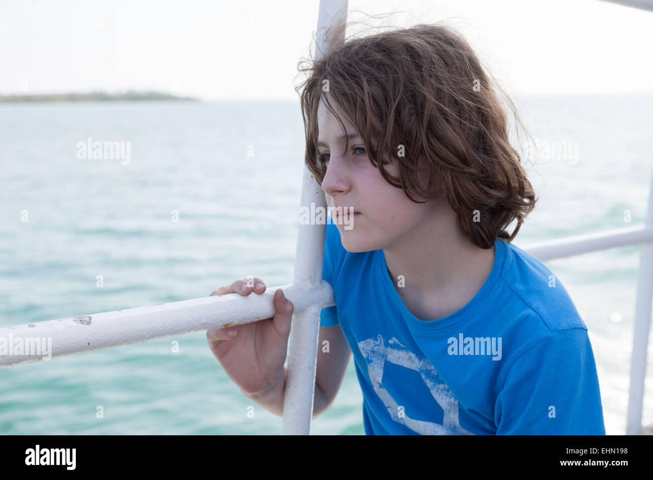 Boy in a boat on holidays. Stock Photo