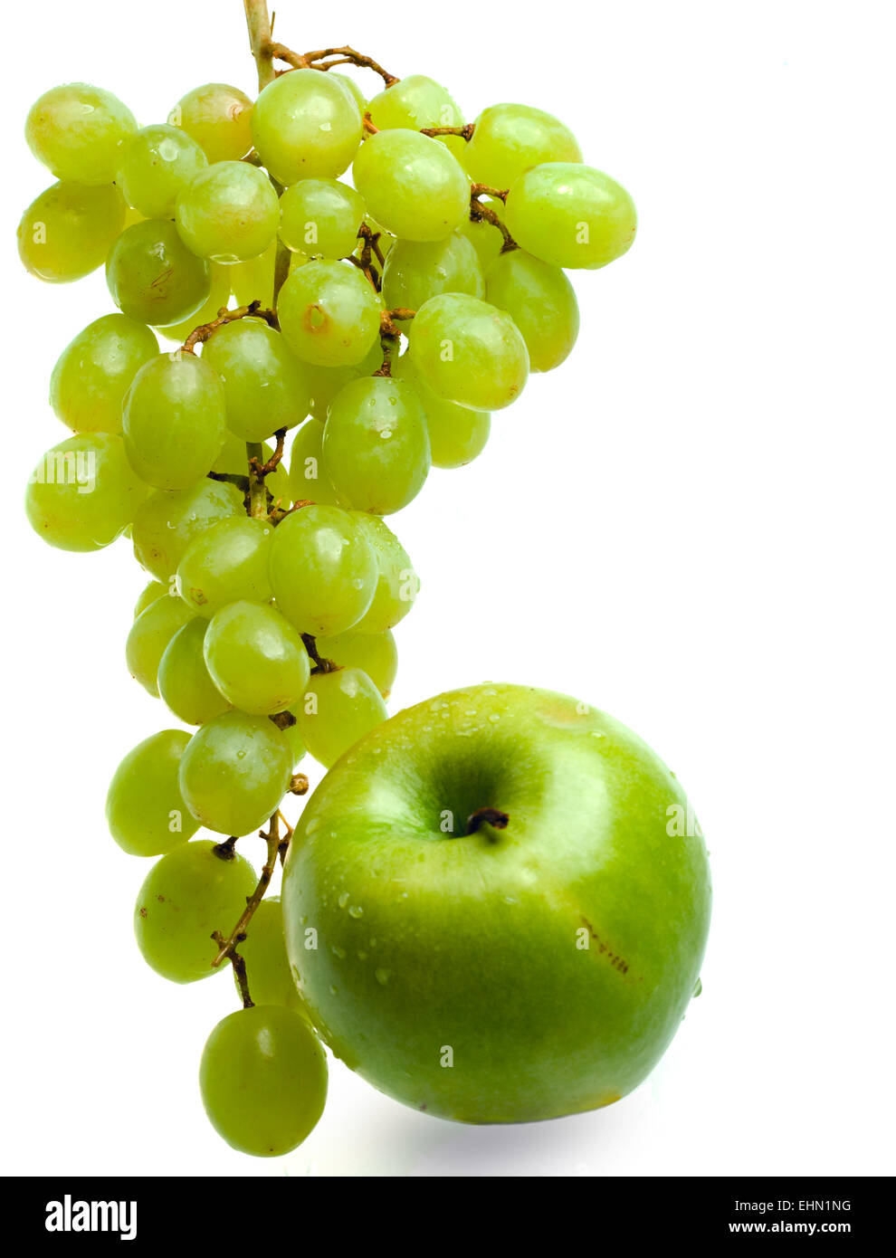 Cluster of grapes in water drops and apple Stock Photo Alamy