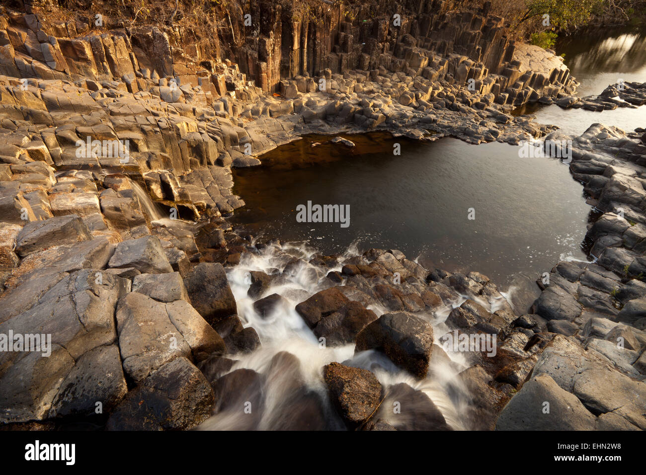 Cubic rocks and waterfall at Agua Blancas, near Penonome, Cocle ...