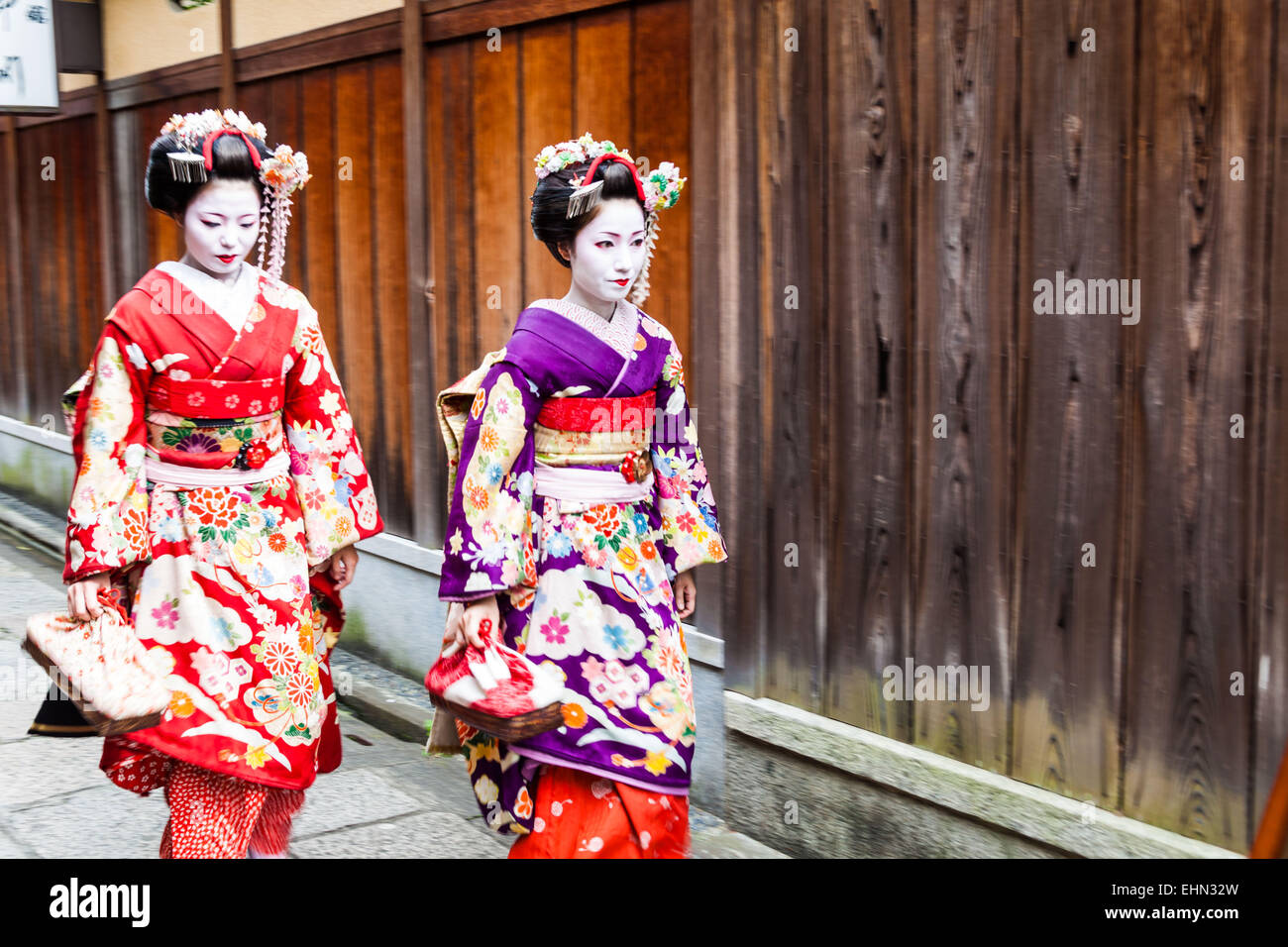 Geishas or geikos et Maikos in a street of Gion, Japan. Stock Photo