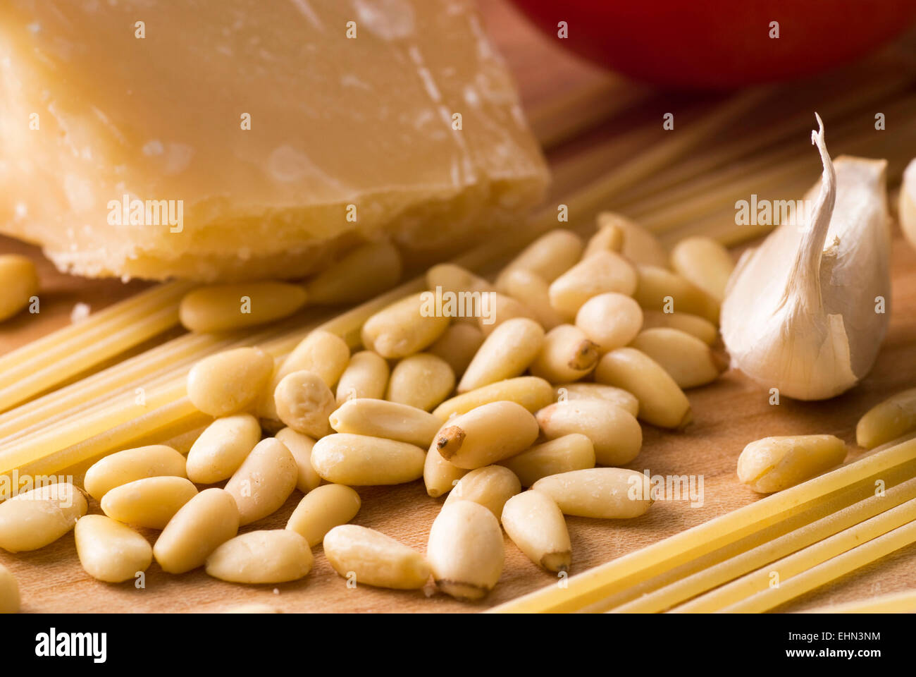 Pine nuts with spaghetti, garlic and parmesan. Stock Photo