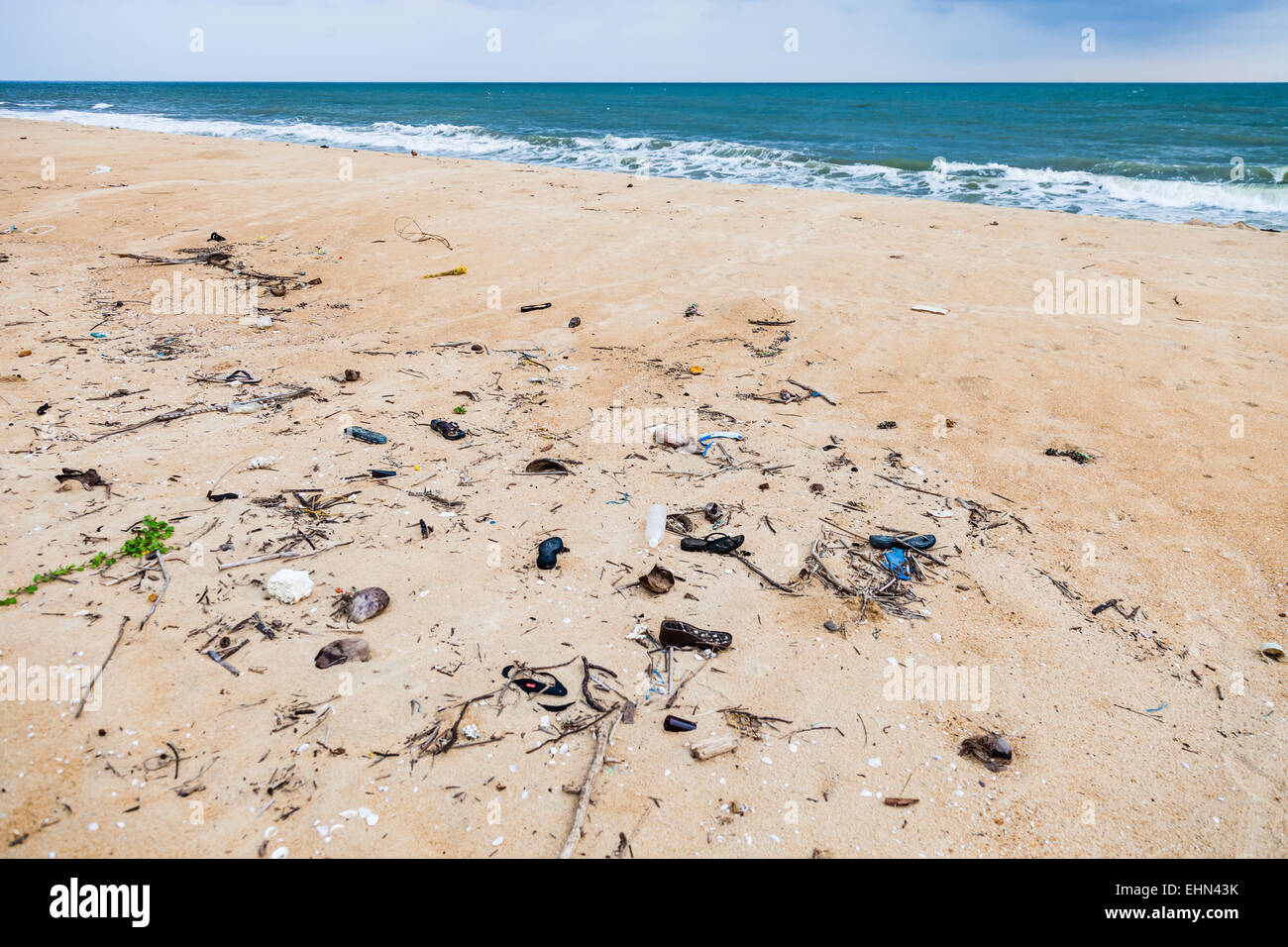 Waste on a beach in Kerala, India. Stock Photo