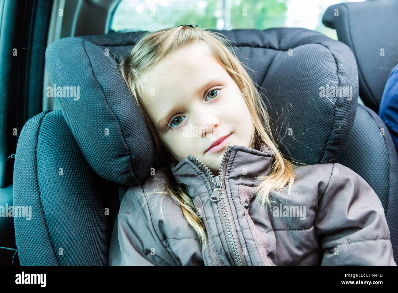 5 year old girl in a car. Stock Photo