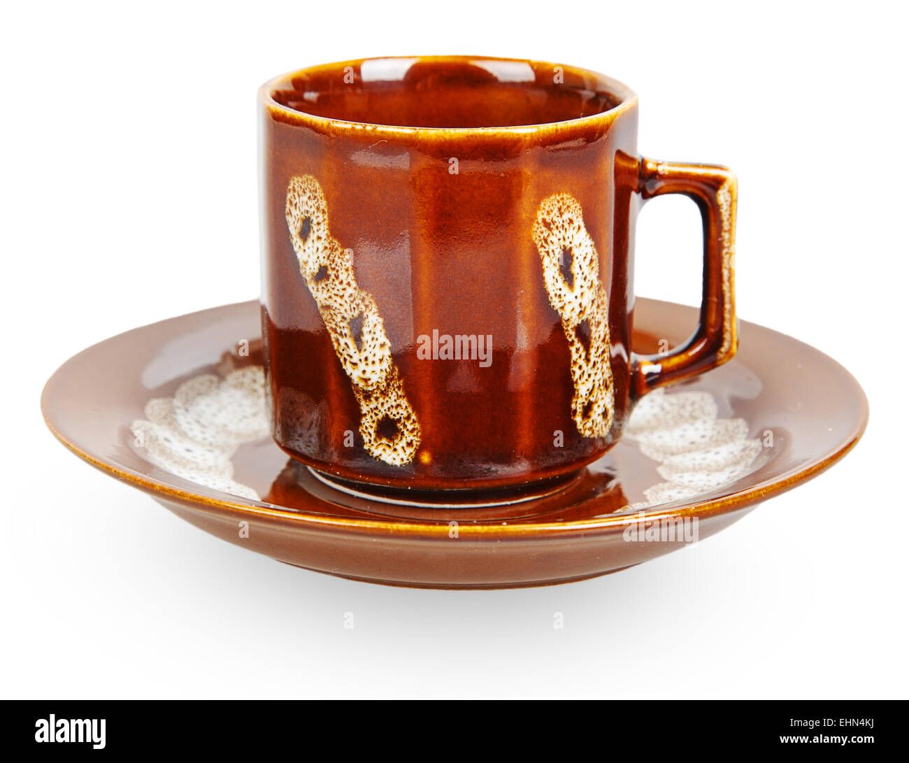 Brown ceramic cup and saucer isolated on white background Stock Photo