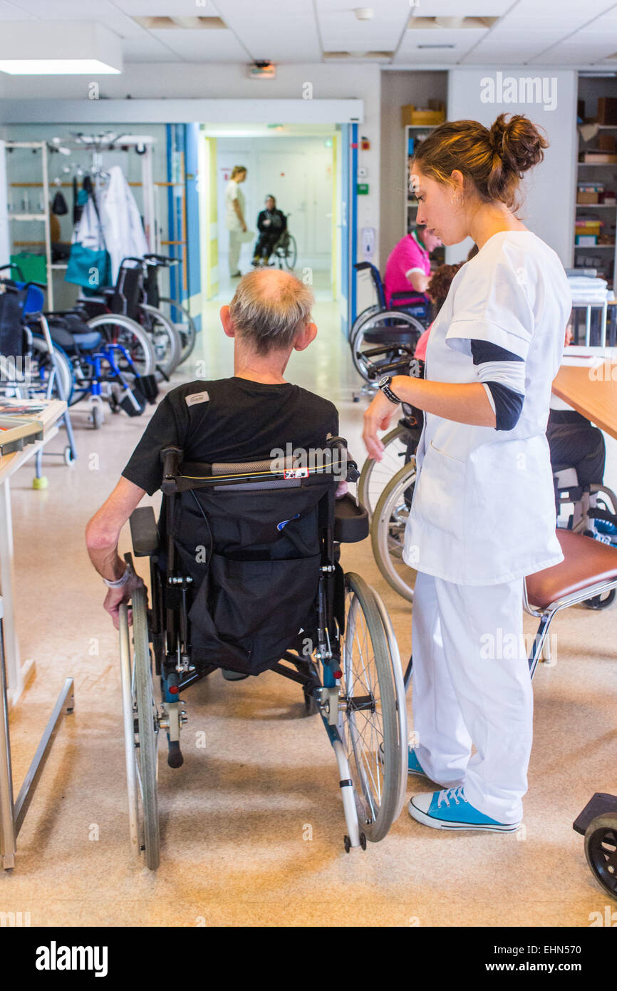 Hemiplegic patient after a stroke, and occupational therapist