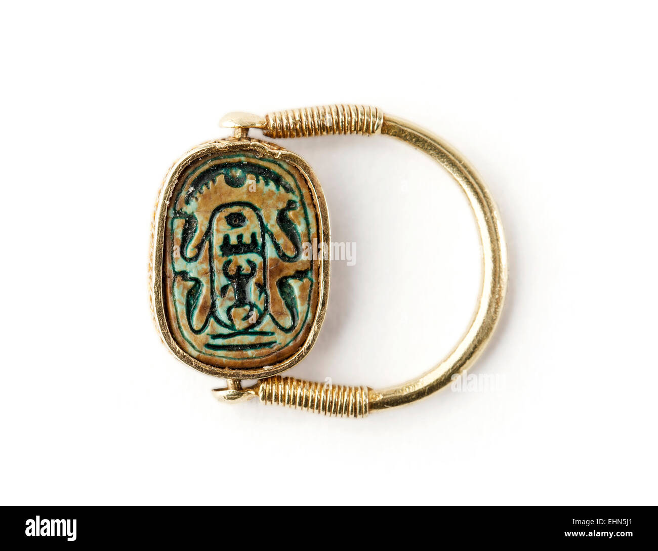Ancient Egyptian glazed plague swivel  ring. Stock Photo